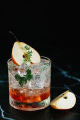 sliced pear on cocktail drink